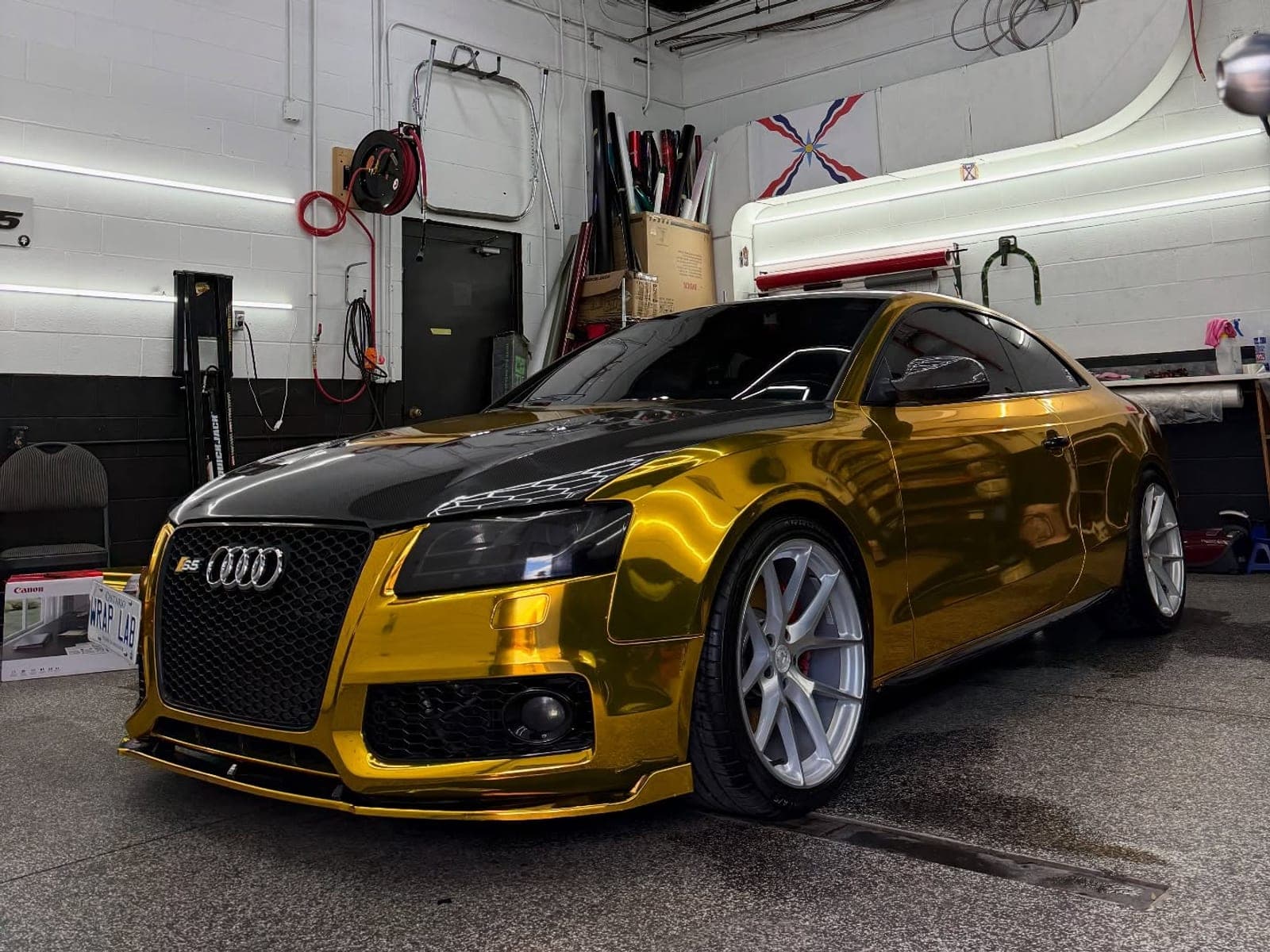 Chrome gold Audi S5 with a gloss black roof and silver wheels