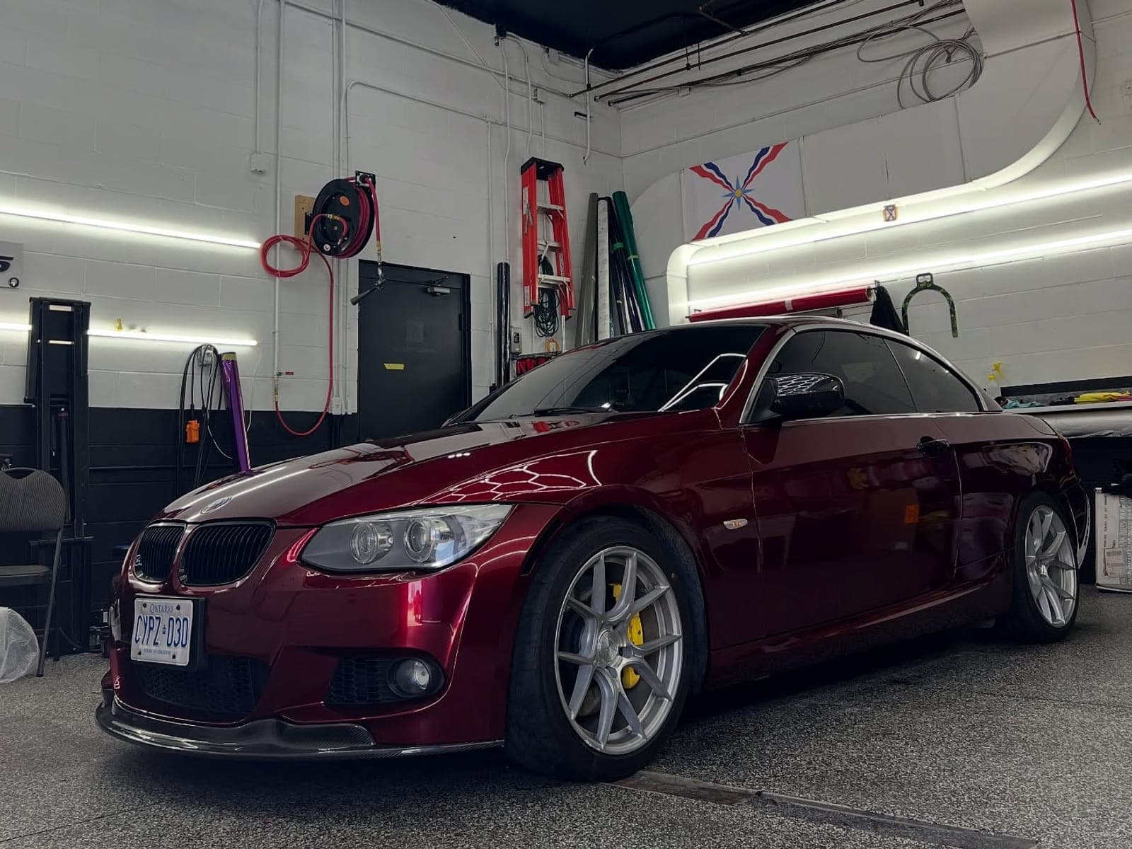BMW E93 convertible in deep gloss liquid dragon red with silver wheels