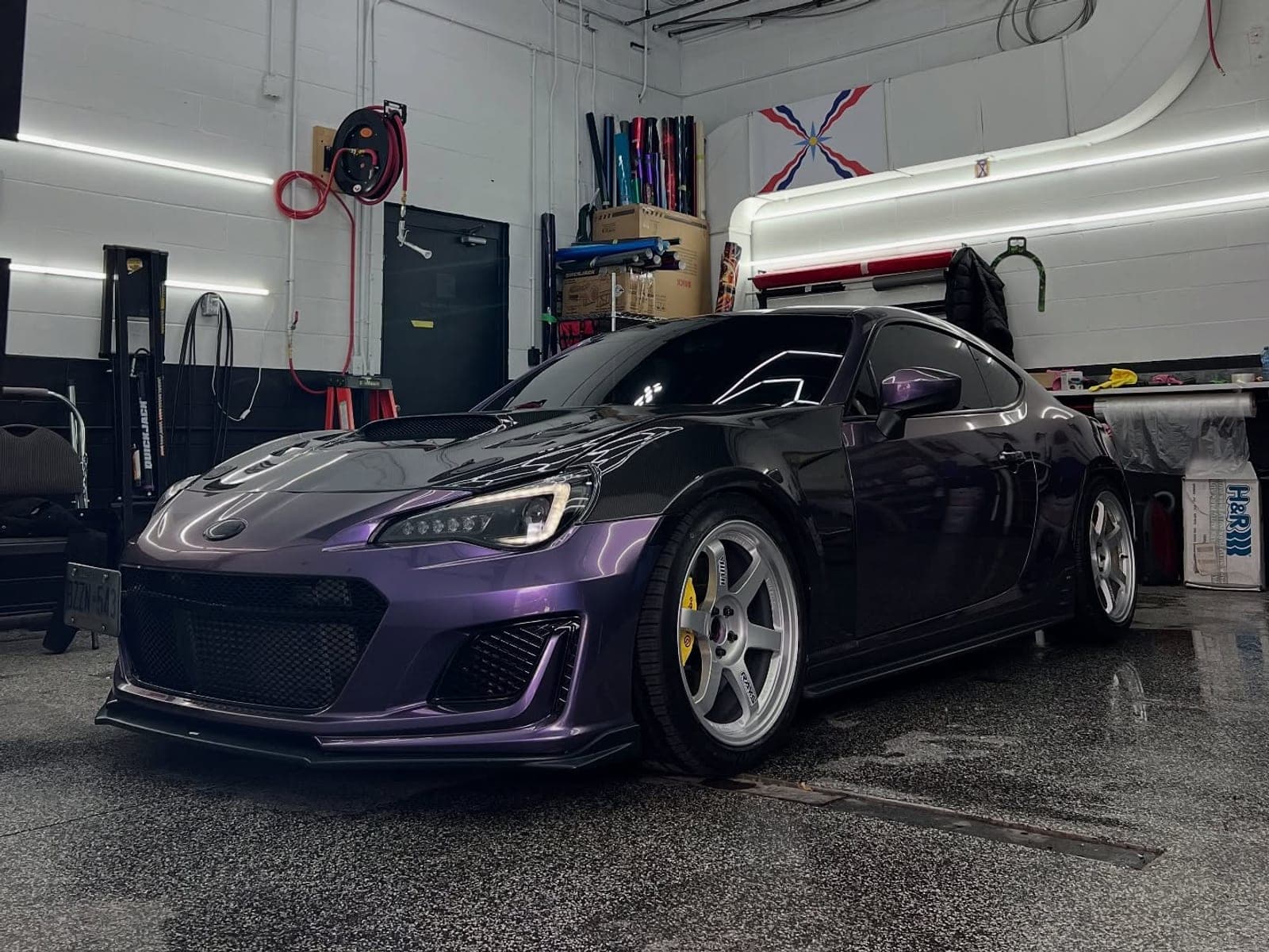 Subaru BRZ in TeckWrap titanium violet with exposed carbon and gold wheels