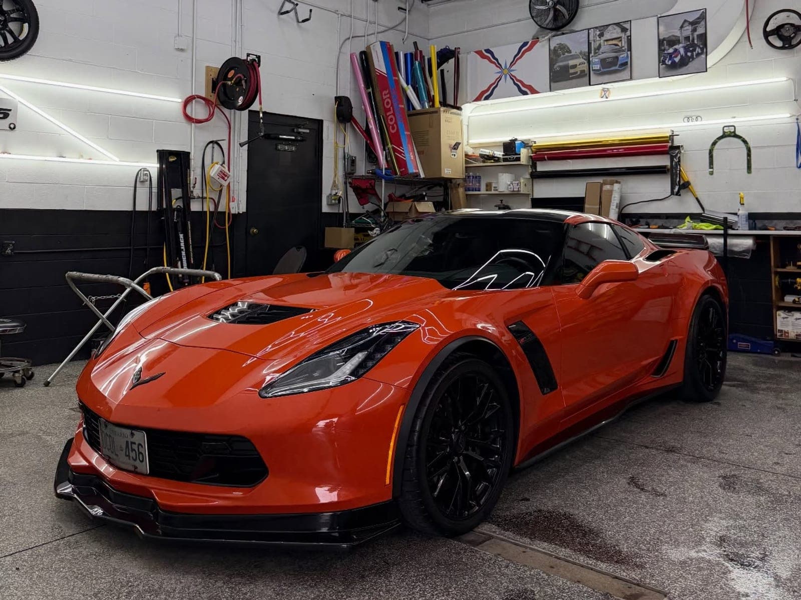 Orange Corvette Z06 with a gloss carbon fibre roof and spoiler
