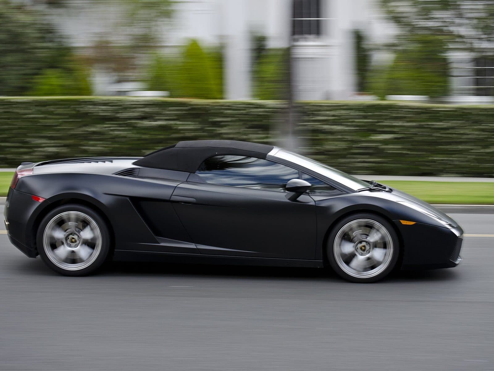 Matte black Lamborghini Gallardo on the road