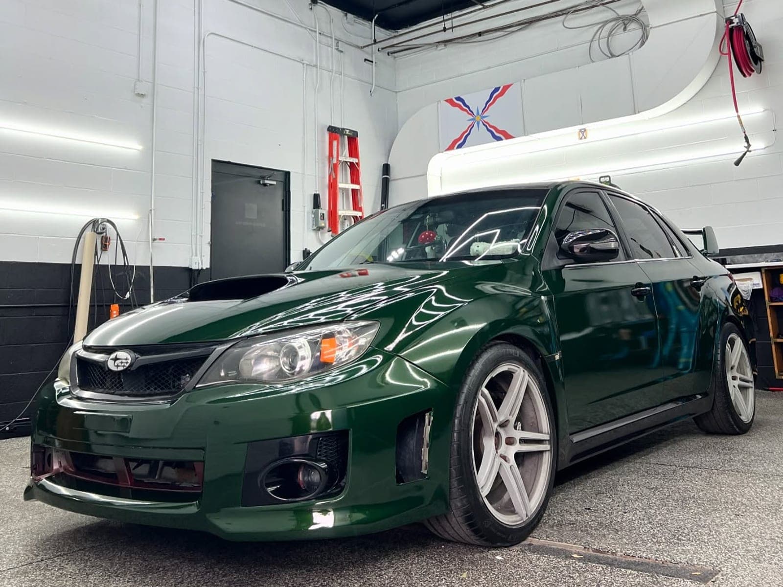 Subaru WRX STI wrapped in gloss Sherwood green